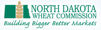 Logo of the North Dakota Wheat Commission with a green state outline, a wheat graphic, and the tagline Building Bigger Better Markets written below in teal cursive.