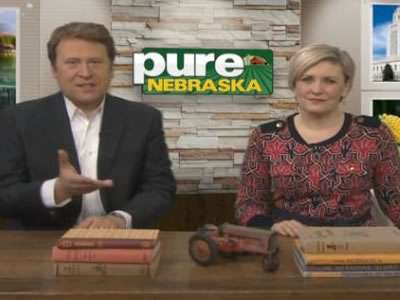 A man and woman sitting at a table.